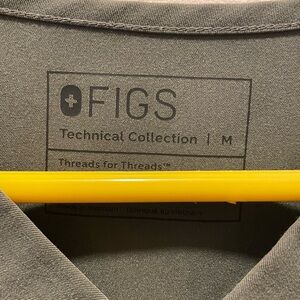 Men’s medium Moss green scrub top, never worn